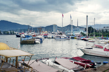 View of the seaport of Batumi, Georgia, cargo ships, yachts and boats in the port