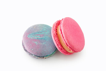 Sweet colorful macarons isolated on white background. Tasty colourful macaroons. Two multi-colored blue and pink macaroons. French pastry made from egg whites.