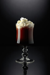 Chocolate cocktail with whipped cream.