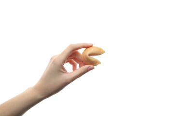 Female hand holds chinese fortune cookie, isolated on white background