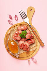 Concept of tasty food, grilled mini sausage, top view