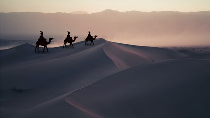 Fototapeta na wymiar Los reyes magos del Oriente, en sus camellos, en el desierto, guiados por la estrella polar. 