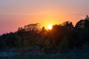 Sunset over the fields and forest. Åland Islands, Finland