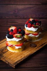 cupcakes with berries and strawberries and chocolate