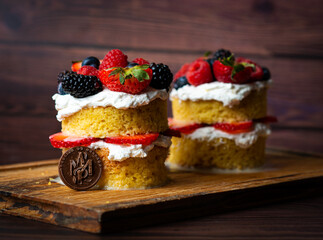 cupcakes with berries and strawberries and chocolate