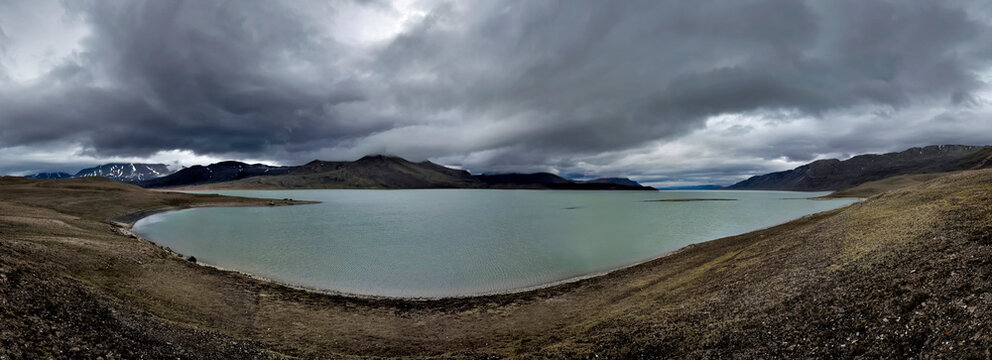 Panoramic view of 8 24mm high portrait images, looking across at the teams base camp on the banks of lake Centrum S��. The larger triangular tent known by the team as the 'wigwam' (Wigwam camp) was us