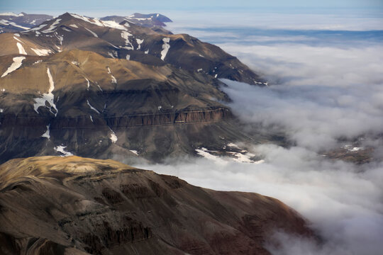 View out of the window of the Twin Otter plane during our flight up from Akureyri in Iceland up to Constable Point on the east coast of Greenland; Northeast Greenland , Greenland