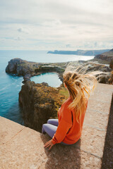 Woman sightseeing Rhodes island travel in Greece outdoor healthy lifestyle active vacations tourist enjoying St. Paul's bay aerial view landscape