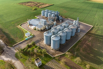 aerial view of huge agro-industrial complex with silos and grain drying line