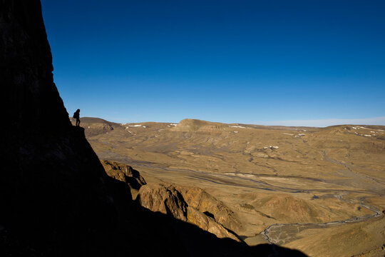 One level on a cliff face containing three caves remained illusive. The team had been forced to look at it from their camp and often pondered about access and how to climb up to it.
