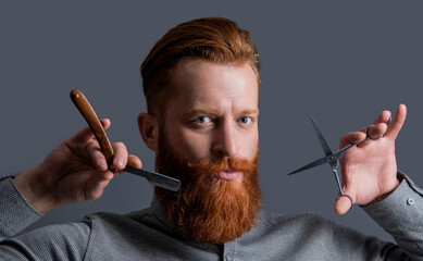 man barber with modern hairstyle isolated on grey background. man with barber hairstyle.