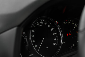 Modern car dashboard with speedometer, tachometer. Car dashboard. Car dashboard details. Modern car...