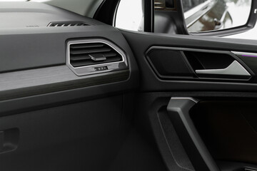 Obraz na płótnie Canvas Modern car leather interior details with stitch. Car interior details.