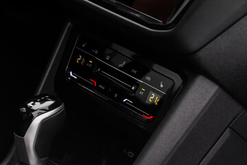 Fototapeta premium Car air conditioner dashboard. Modern car interior. Adjustable air conditioner. Car air conditioning system.