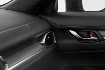 Obraz na płótnie Canvas Modern car leather interior details with stitch. Car interior details.