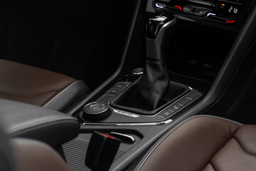 Modern automatic gearbox. Close up of the gearbox transmission handle. Automatic gear stick.
