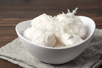 close up bala de coco or brazilian coconut candy, a gourmet homemade sweet dessert made of coconut