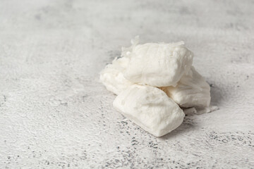 bala de coco or brazilian coconut candy, a gourmet homemade sweet dessert made of coconut