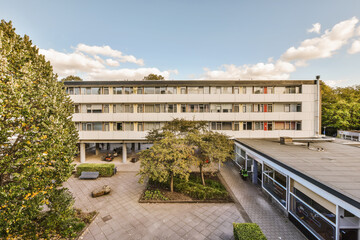 an outside area with buildings and trees in the fore - image was taken from a high angle to show...