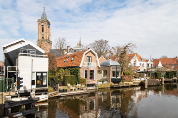 Fototapeta na wymiar Houses along the river Vecht in the picturesque village of Loenen aan de Vecht.