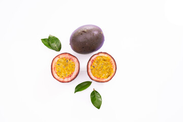 Passion fruit ( Maracuya ) with green leaves isolated on white background