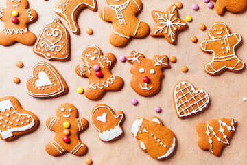 Various selection of Gingerbread cookies with sugar icing. Decorated in Christmas spirit. Happy New Year celebration. Playful and fun. 