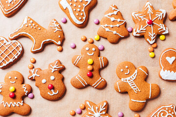 Various selection of Gingerbread cookies with sugar icing. Decorated in Christmas spirit. Happy New Year celebration. Playful and fun. 
