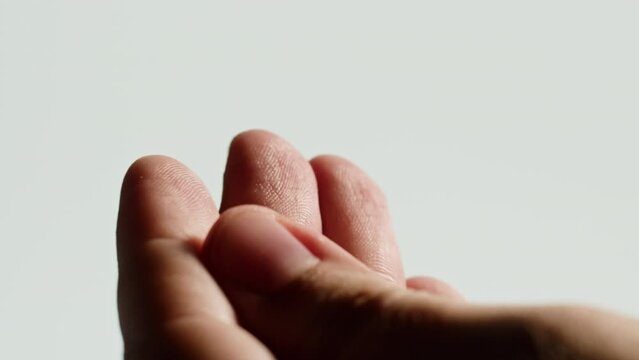 Human hand close-up, skin texture, Palm reading, foretelling the future through the study of the palm, arm macro shooting