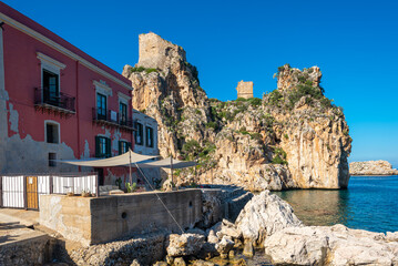 The watch towers Torre della Tonnara at the north coast of Sicily are part of the Tonnara of Scopello, the famous and former tuna factory and fishing station of the village of Scopello