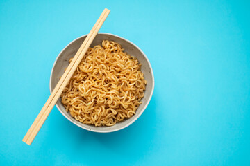 Fresh tasty noodles with vegetables in white bowl