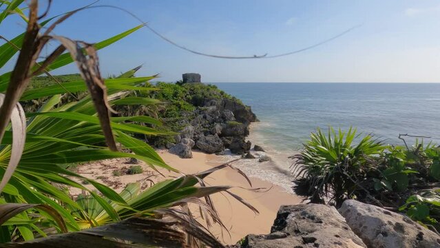 The beautiful Caribbean coast with the purest water in the archaeological zone of Tulum, Mexico. Slow motion footage.