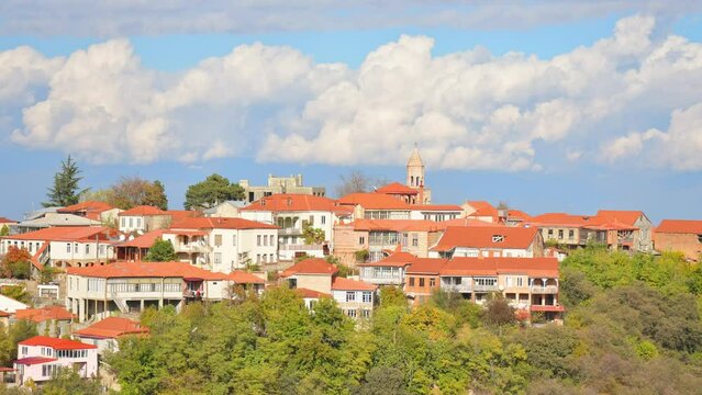 Zoom in time lapse of Sighnaghi city buildings panorama from famous viewpoint. Georgia with caucasus mountains background in autumn.Famous travel destination caucasus