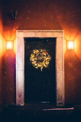 Christmas decoration on the door. Warsaw Old Town. Christmas in Poland.