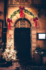 Christmas decoration on the door. Warsaw Old Town. Christmas in Poland.