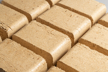 Lot of Wood Briquettes for heating,  textured background