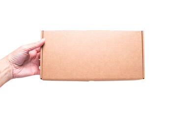 Brown cardboard box in woman hand, isolated