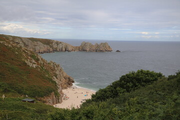 Holidays at Porthcurno beach at Atlantic ocean in Cornwall, England Great Britain