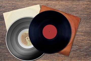 Playing vinyl records. Listening to music from vinyl record player. Vintage music style.