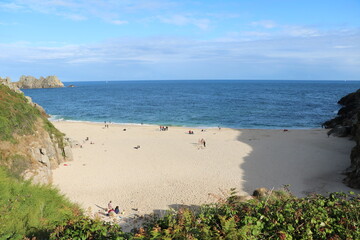 Holidays at Porthcurno beach at Atlantic ocean in Cornwall, England Great Britain