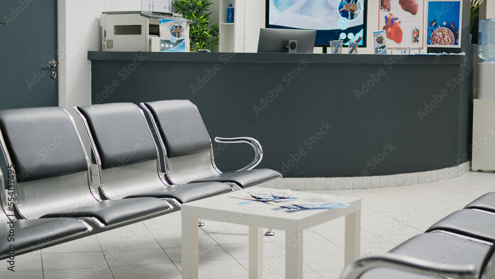 Aufkleber hospital reception space with waiting area in lobby, administative registration counter used by empl