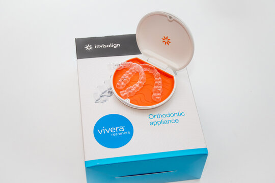 Sydney, Australia, 2022-10-19 Invisalign Vivera retainers in a box. Ortodontic clear retainers used to protect the results of Invisalign bracers treatment