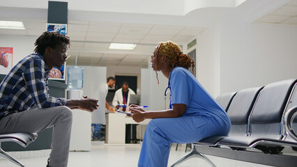 Medical staff doing examinations with african american people, patients with illness waiting in...