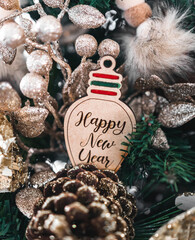 Christmas pine cone decoration with snow from a christmas tree background