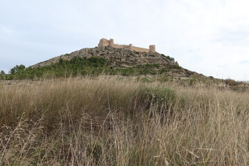 Fototapeta na wymiar Castalla, Alicante, Spain, December 15. 2022: Castalla Castle on top of the mountain, Alicante. Spain