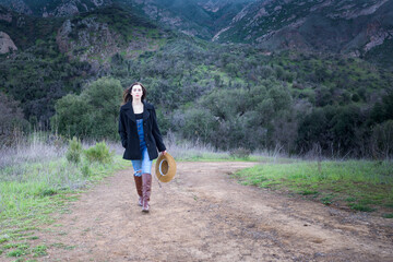 Country girl walking on a country road