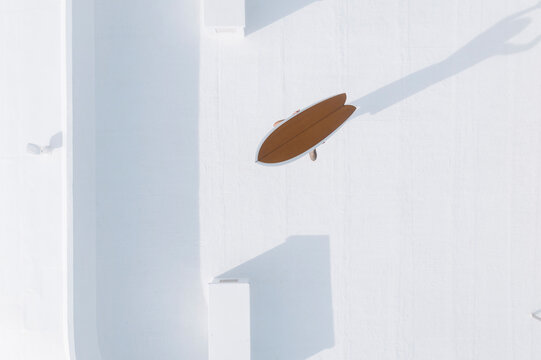 Aerial view of surfer at sunny day