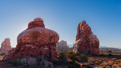 Morning sun on rock formations - Arches National Park