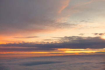 Fototapeta na wymiar Awesome view of twilight . Dusk over the clouds