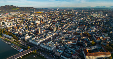 Aerial wide view around the city Linz an der Donau in Austria on a sunny autumn afternoon.