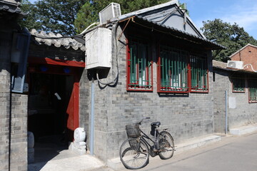 bicycle in front of a house